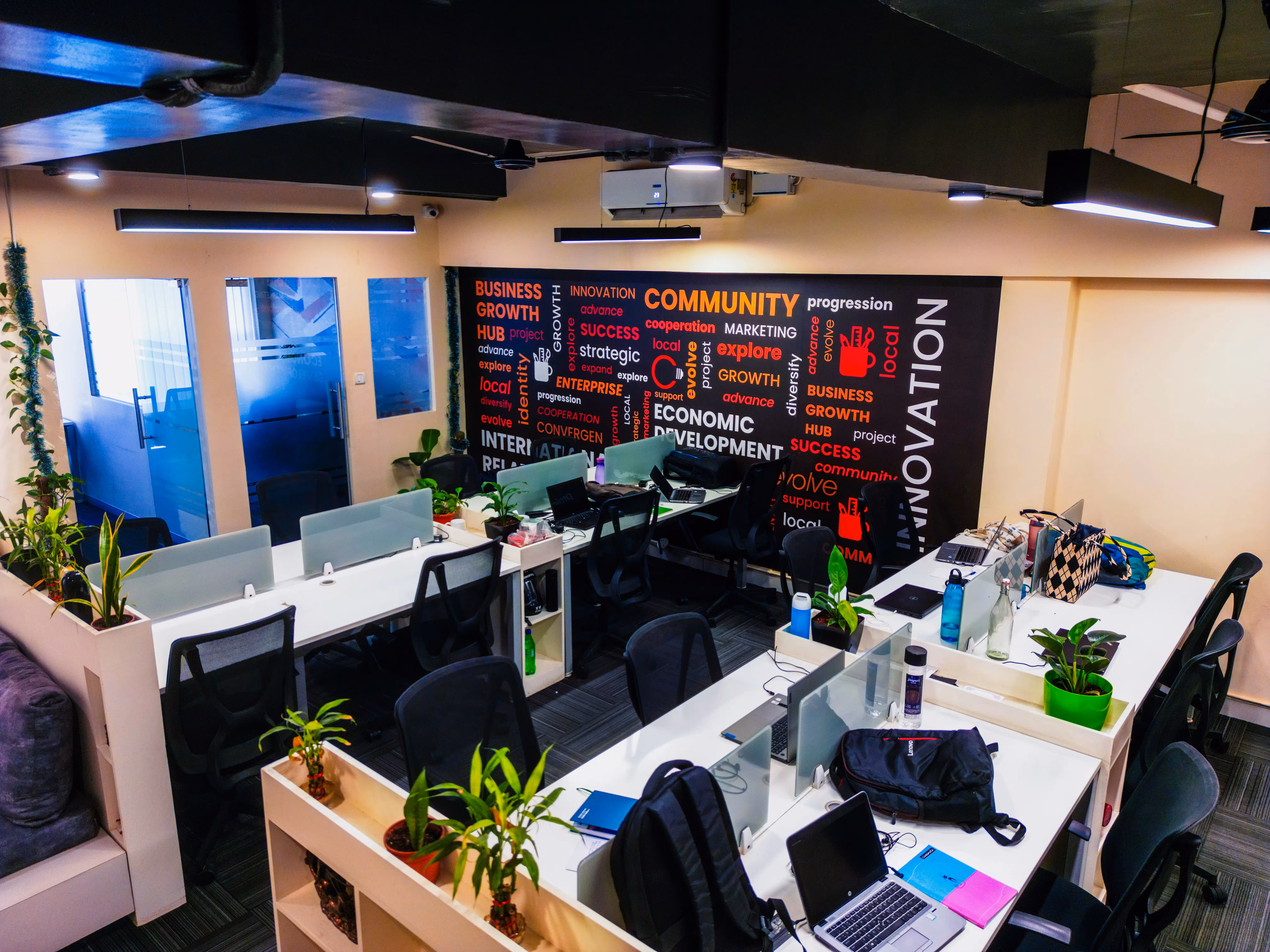 Open workspace with community mural at Creware Bangalore