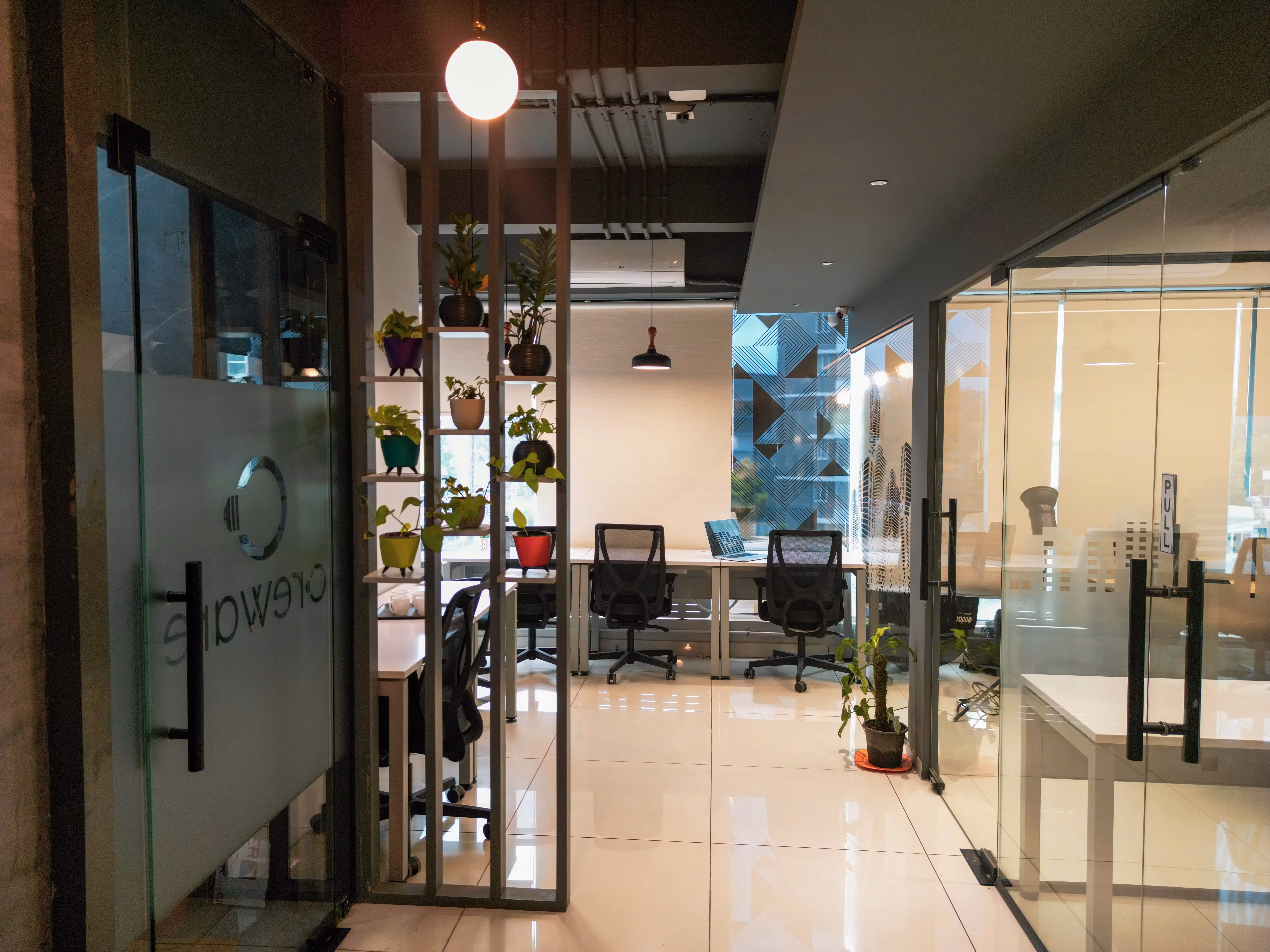Private cabin with plant shelf at Creware Bangalore